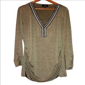 AGB V neck long sleeve top with beaded accents.